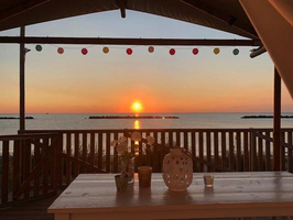 Luxe Tent Silver Seaview : Zonsopgang vanaf de veranda 